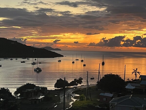 Amazing Sunrise from Your Private Deck at Coral Bayside Studio!