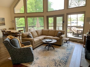 Wall of windows overlooking Lake Oconee with updated furnishings