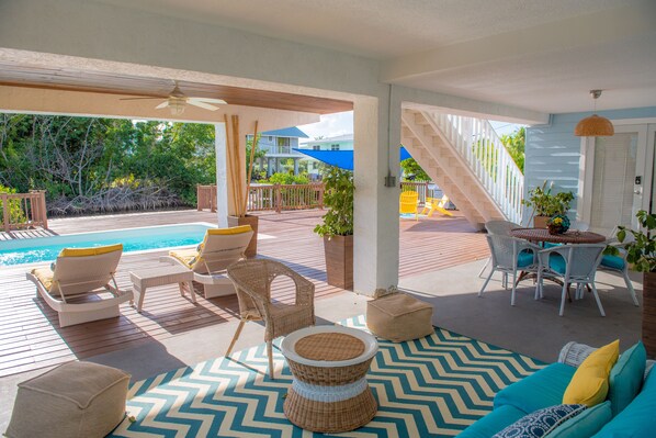 Large outdoor deck with inviting pool