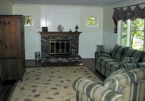 Lovely family room with wood fireplace
