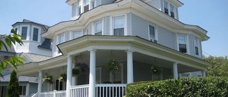 Classic shore house with wrap-around porch. 1/2 a block from the beach.