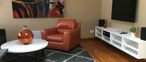 Living room with large flat screen TV 