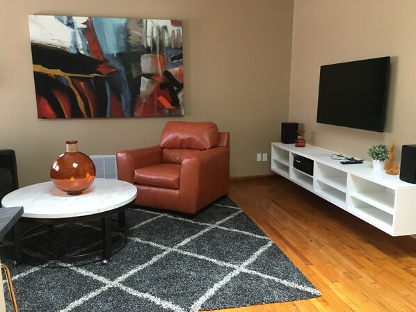 Living room with large flat screen TV 