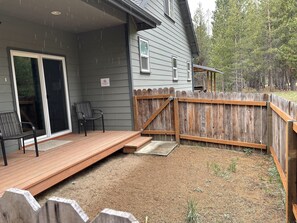 Side deck by front living room.  Secure fence area 