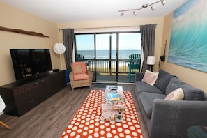 Clean and comfortable living room with pull out sofa