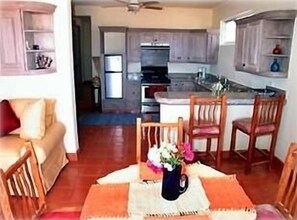 Dining area looking into kitchen