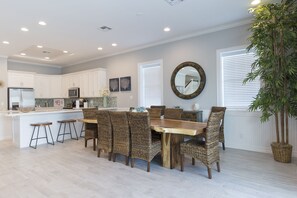 Large dining table great for family dinners and extra seating in the kitchen area!