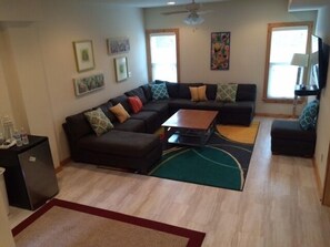  Entry level spacious seating with 55 inch  tv w/Roku. 