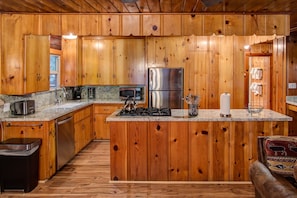 Kitchen with Stainless Steel Appliances and Granite Countertops