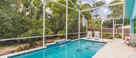 Plenty of seating around the pool. Property is enclosed on all sides