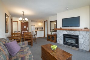 Open living room, dining area and kitchen