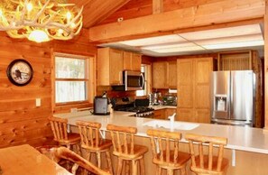 Kitchen Area with premium stainless steel appliances