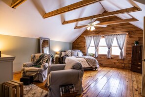 This master suite with Queen bed makes you never want to leave your room!