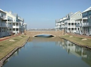 Canal located behind condo overlooking bay