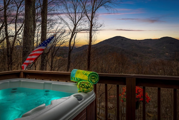Imagine relaxing in the hot tub watching the sunset over the mountain.