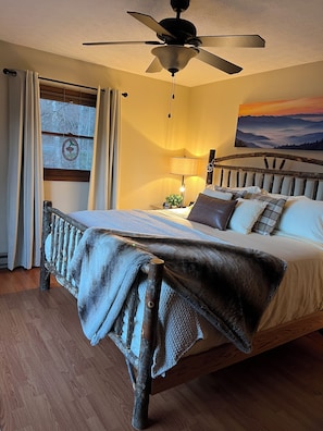 Luxury surrounds in this hickory king bedroom with private bath. Smart TV.