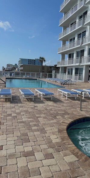 Refurbished pool deck with beautiful furniture!