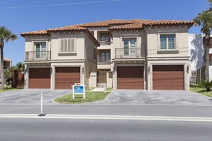 Street view of the beach house! It is the townhome on the right side (south). Garage is available, garage suite/apt is NOT included in this rental. See description.