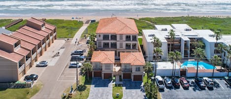 Aerial of our beach house! It is the townhome on the right side (south). Garage is available, garage suite/apt is NOT included in this rental. See description.