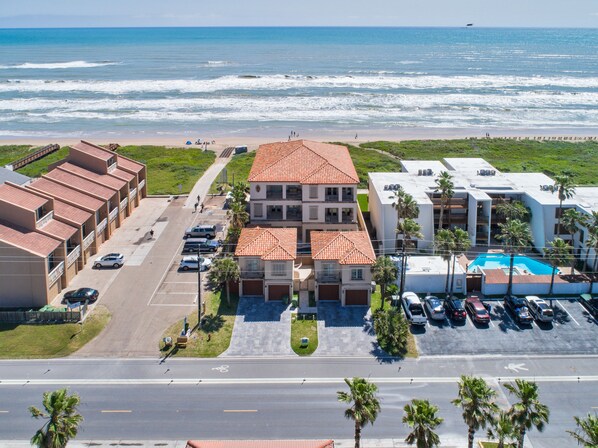 Aerial of our beach house! It is the townhome on the right side (south). Garage is available, garage suite/apt is NOT included in this rental. See description.