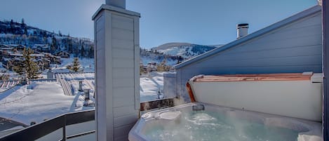 Hot Tub with Mountain views . Chimney has been removed, for an even better view.