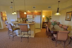 Full kitchen and dining area