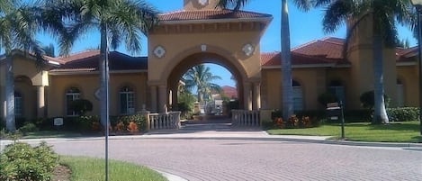 Entrance to condo complex gated.