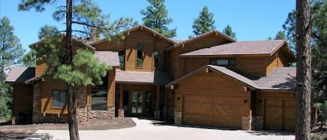 Front of home and paver driveway