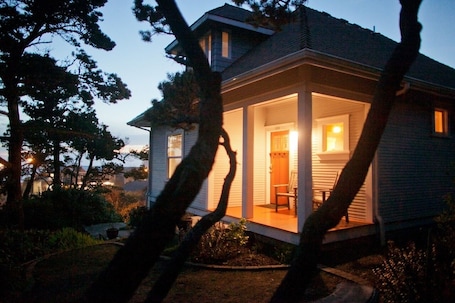 Welcome to our 1910 home. Ocean in the background.