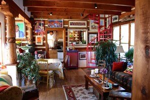 The Living Room at Casa Carmen! Windows line the room with beautiful scenery...
