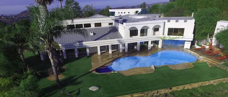 Very Private pool area. The guest apartment can be seen in the background.