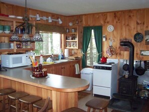 Fully furnished kitchen. Includes items for lobster dinner.