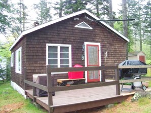 Entrance to cottage. Includes deck and patio set. Relax and enjoy the view!