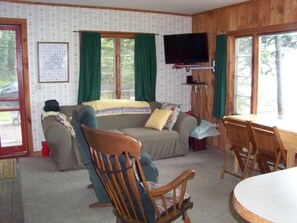 Living room/eating area. Open concept to kitchen.