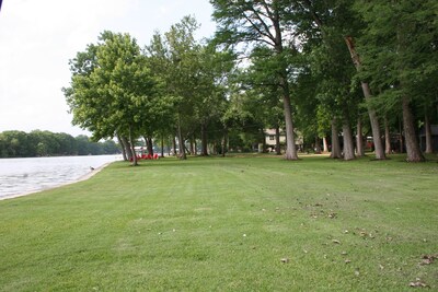 Waterfront Home on lake Dunlap and 2.5 acres of  beautiful 100' Cypress trees 