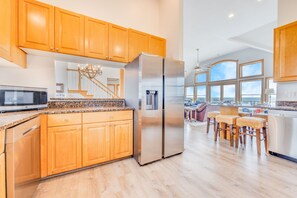 Effortless cleanup awaits with dual sinks and twin dishwashers for ultimate convenience.