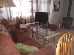 Smart TV, large coffee table, pull out sleeper couch, gas fireplace!