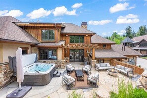 Backyard patio. Hot tub/outdoor seating area (Only out in summer, spring, fall)