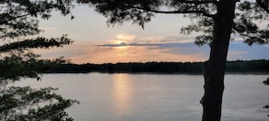 Everyone loves the beautiful sunsets over the bay viewed from the cottage.