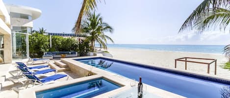 Direct beachfront - private pool & hot tub