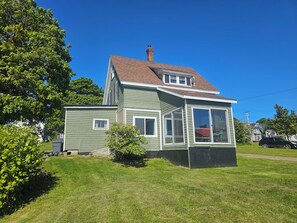 Exterior view of sun porch/house.