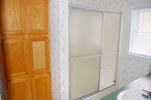 Roomy Master bath with walk-in shower.