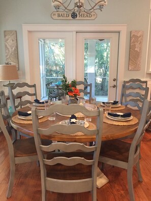 Gorgeous round wood table with seating for 8