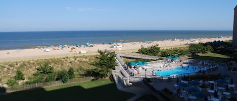 View of outdoor pool in front of the Edgewater House and the walk to the beach.