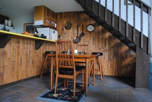 Dining Area.  Other folding chairs are in the condo.