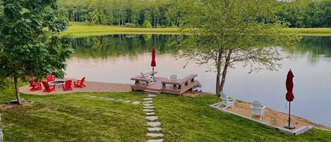 Fire pit, dock and private beach with gentle sloping access to Lake Grendel