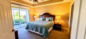 Comfortable King size bed with views to the lake and fountain.