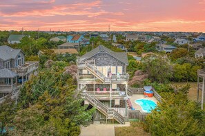 Amenities abound at this 4-bedroom home, starting with the private swimming pool and an inviting hot tub.