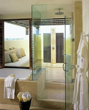 Bathroom counter tops in Mexican-quarried, sealed ivory travertine