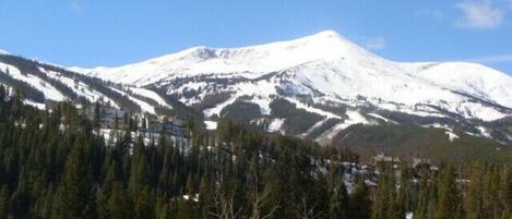 View of Breckenridge Ski Resort from private deck with hot tub